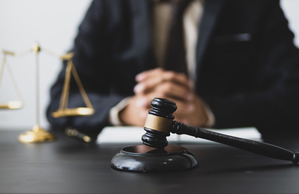 Concept of legal justice. Lawyer is working in a law firm.